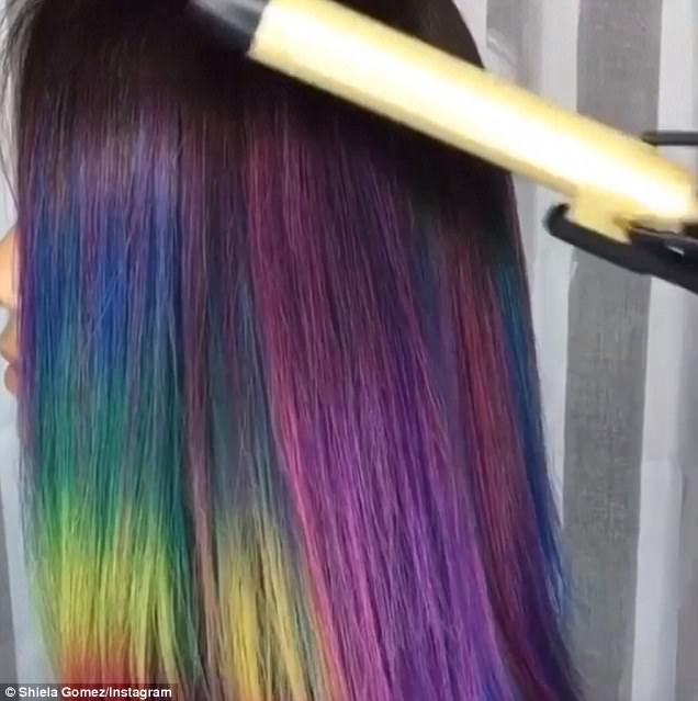 From purple to pink: Taylor Rae , who is a Pravana Vivids specialist in Denver, Colorado, ran a hot curling iron over a client